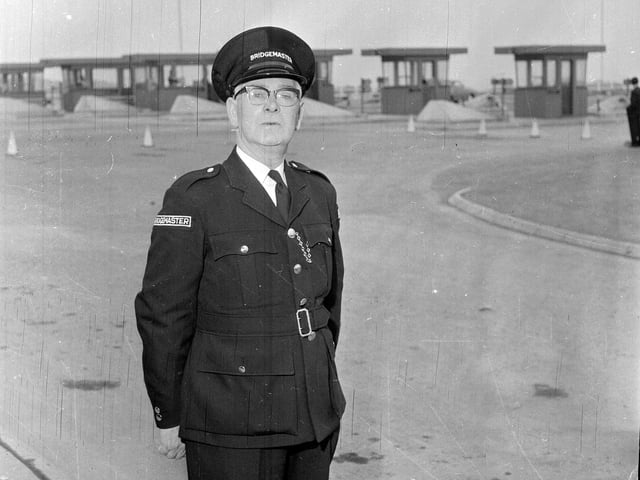Mr R Wilson, the first Forth Road Bridge Master, in front of the tollbooths in 1964.