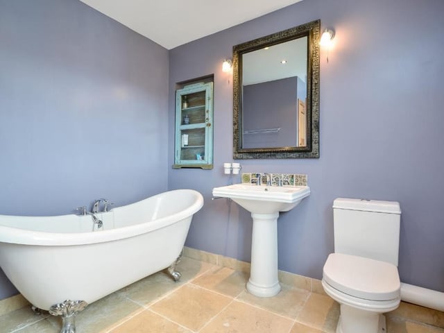 There is a bathroom and separate shower room