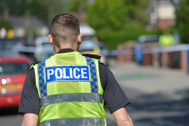 Police have carried out a series of raids in Sheffield today. Stock picture of a South Yorkshire Police officer