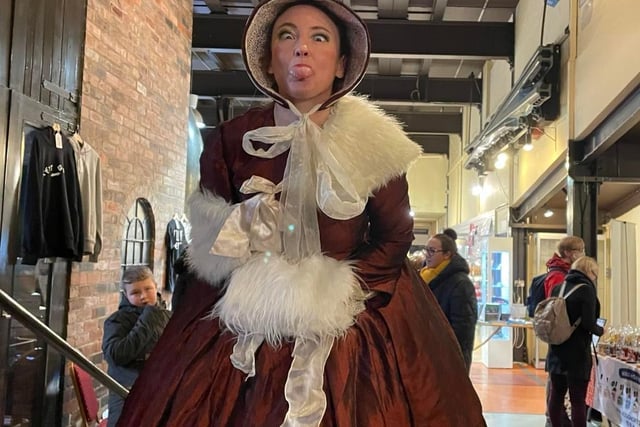 A Victorian woman atop stilts was one of the many period-dressed entertainers at the Kelham Island Museum's Victorian Christmas market this weekend.