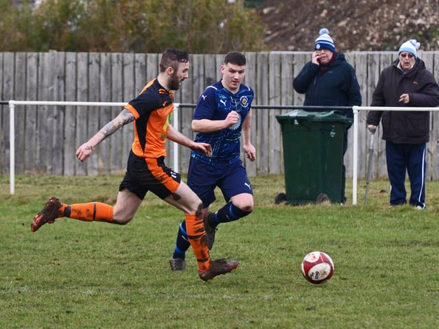 Sam Corner gets down the wing for Scawthorpe.