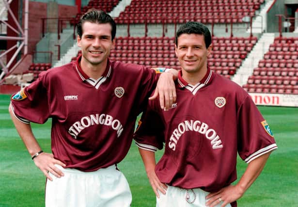 Stephane Adam and Thomas Flogel after signing in 1997.