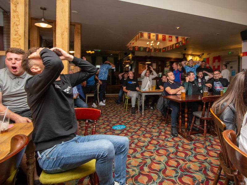 Moment of frustration captured. Fans at the Green Post, Hilsea, Portsmouth on 19 June 2021. Picture: Habibur Rahman