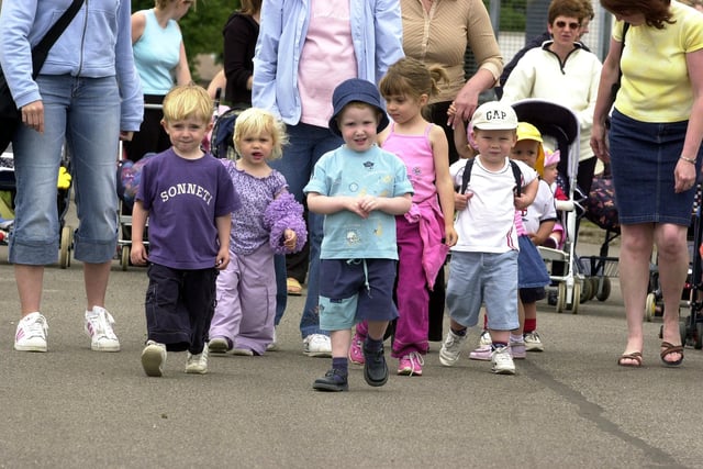 Flying Start nursery youngsters set off on their sponsored walk at Finningley Airport in 2003