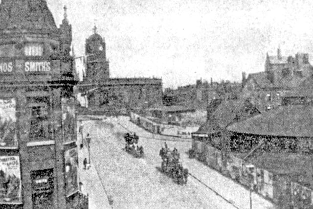 Pinstone Street in Sheffield city centre, showing Sanger's Circus on the right and St Paul's Church in the background. This photo is believed to date from between 1851 and 1899