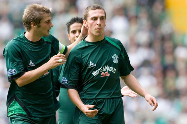 Brown is congratulated by Kevin Thomson after scoring for Hibs at Celtic Park, the stadium he would ultimately call home for 14 years.