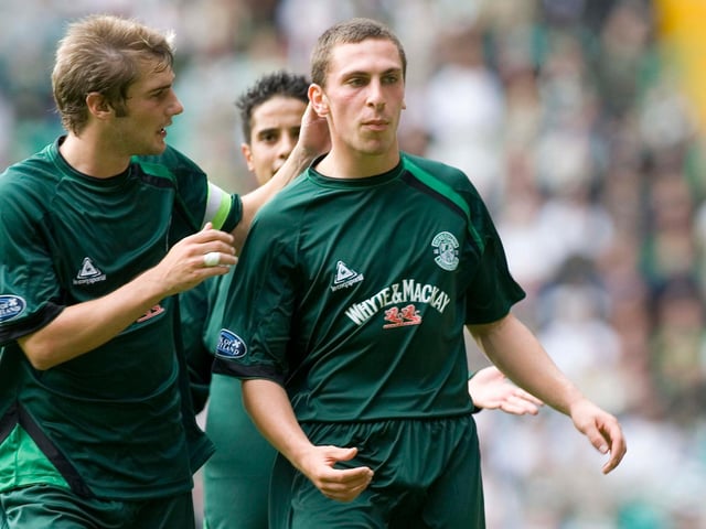 Brown is congratulated by Kevin Thomson after scoring for Hibs at Celtic Park, the stadium he would ultimately call home for 14 years.