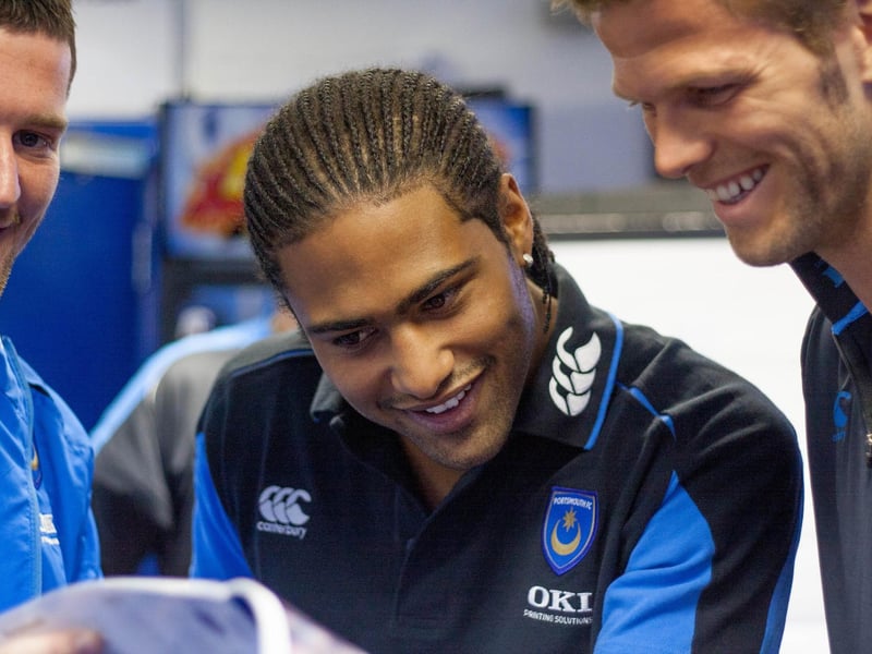 David Nugent, Glen Johnson and Hermann Hreidarsson spot something funny in the programme notes. Picture: Habibur Rahman