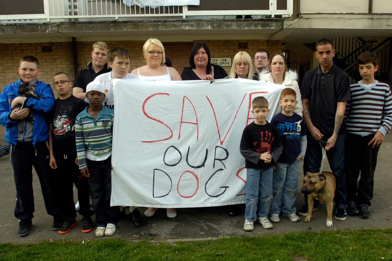 Residents on the Winn Drive estate in Hillsborough are unhappy after receiving letters from Sheffield Homes telling them they must get rid of their pet dogs and cats. Angry residents with a banner saying 'Save our Dogs'