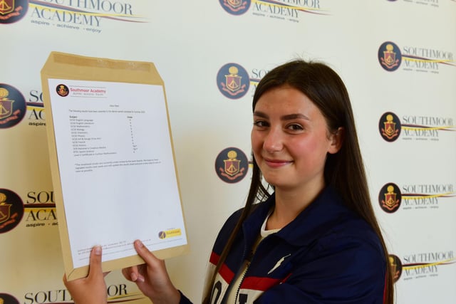 A big smile from Alice Ward, who scored grade 9s across the board. She received 10 of them. She plans to study biology, chemistry, maths and art next year.