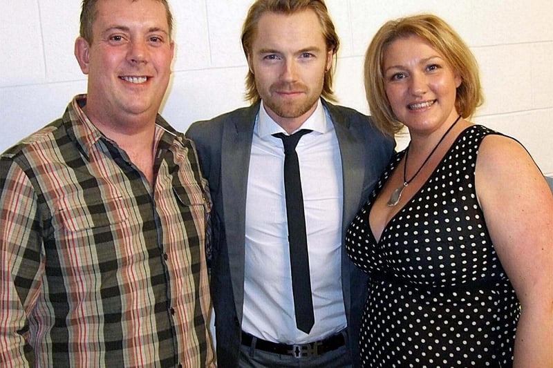 Boyzone star Ronan Keating was pictured backstage at Sheffield Arena in 2008 with Star meet and greet winniers Andy and Dena Littlewood
