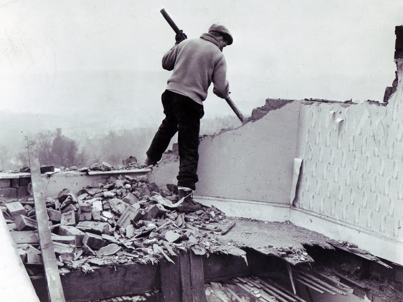 Sheffield Hurricane damage 16th February 1962
A workman starts demolition work at Brightside Vicarage in Firth Park Avenue, Sheffield, where Mrs Shirley Margaret Hill, wife of the vicar, the Rev Colin Hill, was killed during the gale. The vicarage was so badly damaged it was beyond repair.