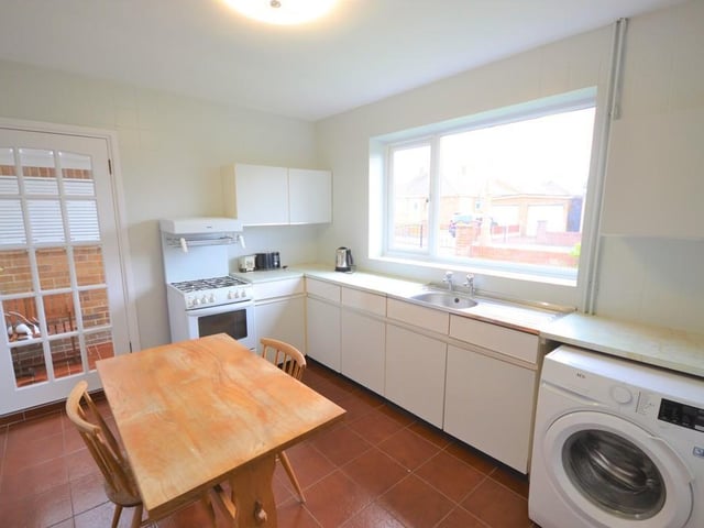 A good sized breakfast kitchen having a range of white base units with contrasting worktops, there is space for a free standing cooker, space and provisions for a washing machine, stainless steel wash bowl, two useful storage cupboards and a side door opens to the conservatory.
