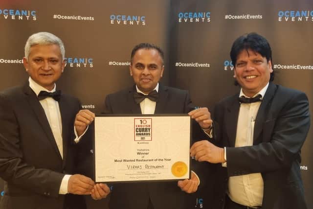 Abdul Rouf, Head Chef at Viraaj, Sufi Miah, manager at Viraaj, and Assistant Manager Ahmed Hussain pictured with their award