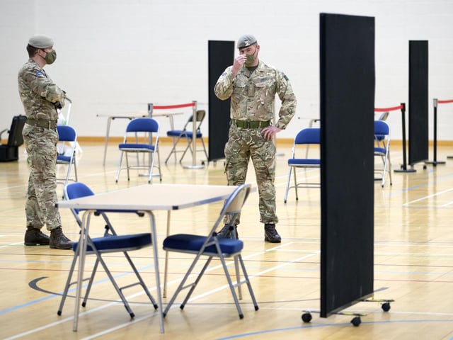 Members of the Royal Scots Dragoon Guard carry out a reconnaissance before setting up a Covid–19 vaccination centre at the Ravenscraig Regional Sports Facility in Motherwell