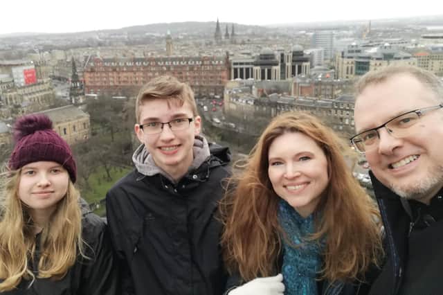 Jeannie McGinnis and her family on a trip to Edinburgh