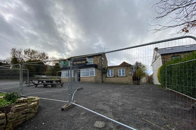 Fencing surrounding the Royal Oak pub after the chemical spillage was discovered