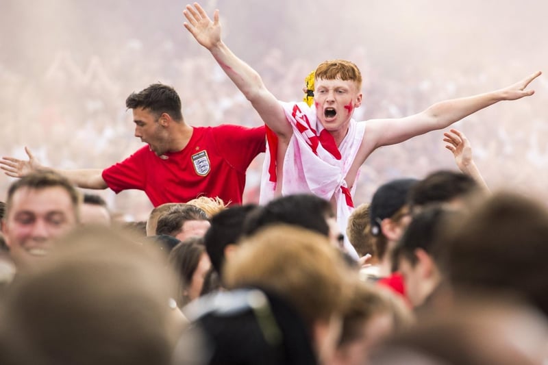 Fans cheer on England during the World Cup 2018 semi-final against Croatia, which was screened on Devonshire Green in Sheffield