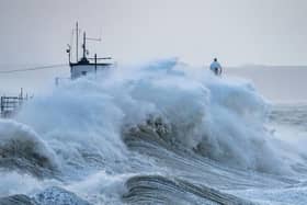 Waves crash against the harbour wall during Storm Eunice in Porthcawl, Wales. (Photo by Matthew Horwood/Getty Images)