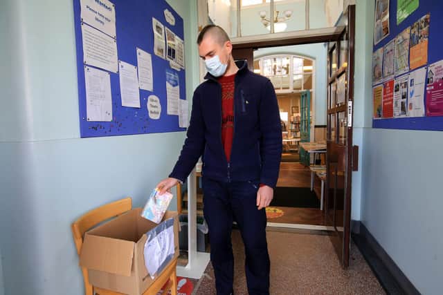 Pictured is Edward Lawrance returning his books to Walkley Library
