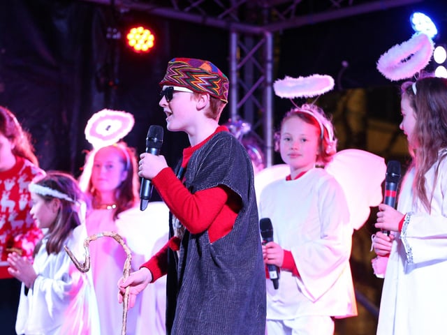 SD Studios Choir performing at the Christmas lights switch on in Palmerston Road, Southsea. Picture: Chris Moorhouse (251121-48).