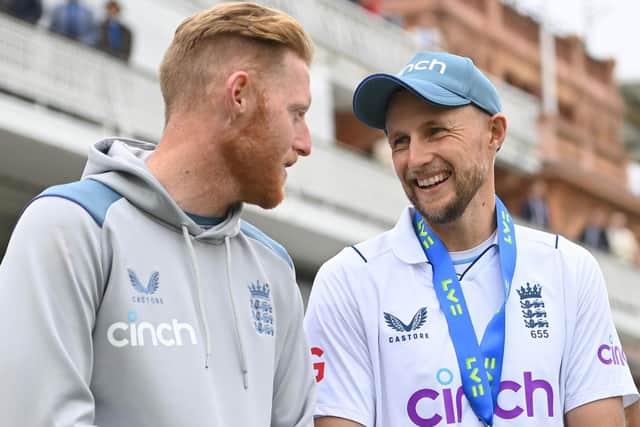 LONDON, ENGLAND - JUNE 05:  Man of the Match Joe Root of England shares a joke with England captain Ben Stokes after day four of the First LV= Insurance Test match between England and New Zealand at Lord's Cricket Ground (Photo by Gareth Copley/Getty Images)