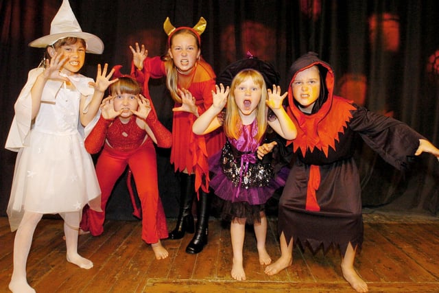 Halloween kids prowl the stage as part of the fashion show to raise funds for Amy's House in Handsworth in October 2005