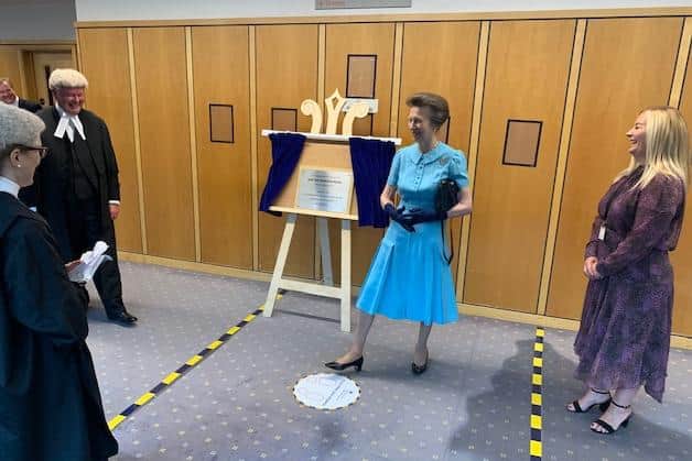 Princess Anne unveils a plaque at Sheffield Combined Courts Centre and Sheffield Crown Court to mark the building's 25th anniversary since it was opened.