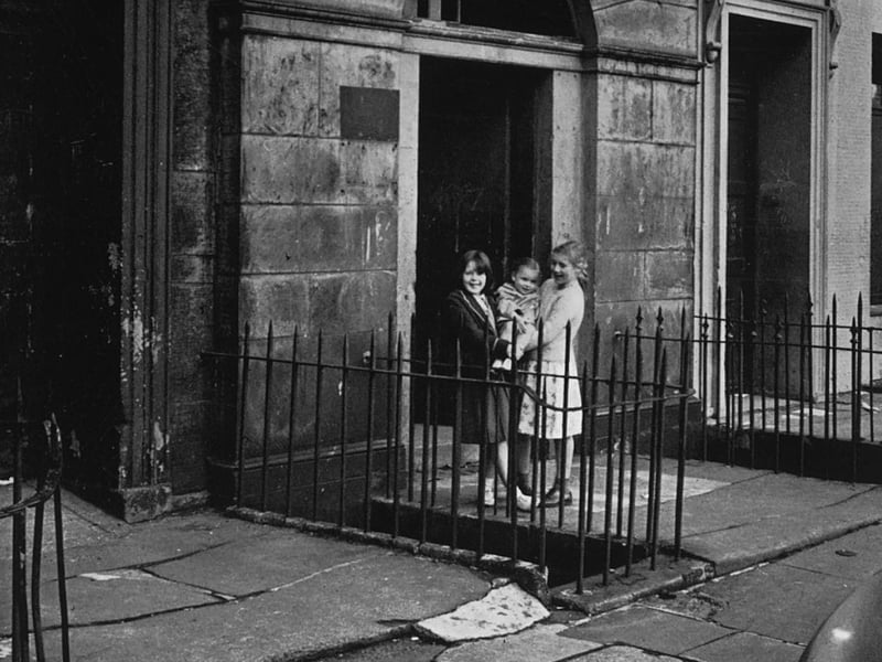 Children posing for a photograph in St James Square, 1960s.