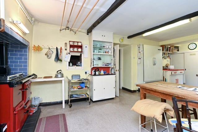 The dining kitchen leads on to a separate utility area.