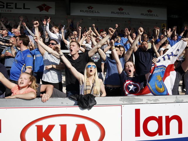 Pompey fans celebrate at the final whistle
