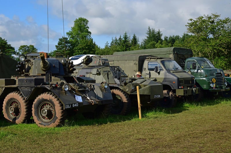 Military vehicles were well equipped to handle the muddy terrain at the rally.