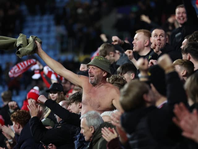 Fans of Wrexham celebrate during the FA Cup win over Coventry City (Catherine Ivill/Getty Images)