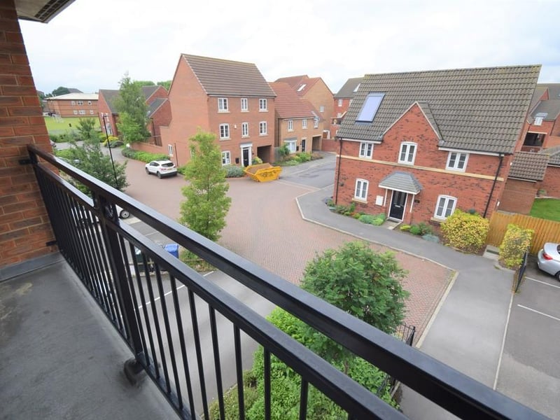 French doors opening onto to a south facing balcony to sit and relax with afternoon and evening sun aspect.