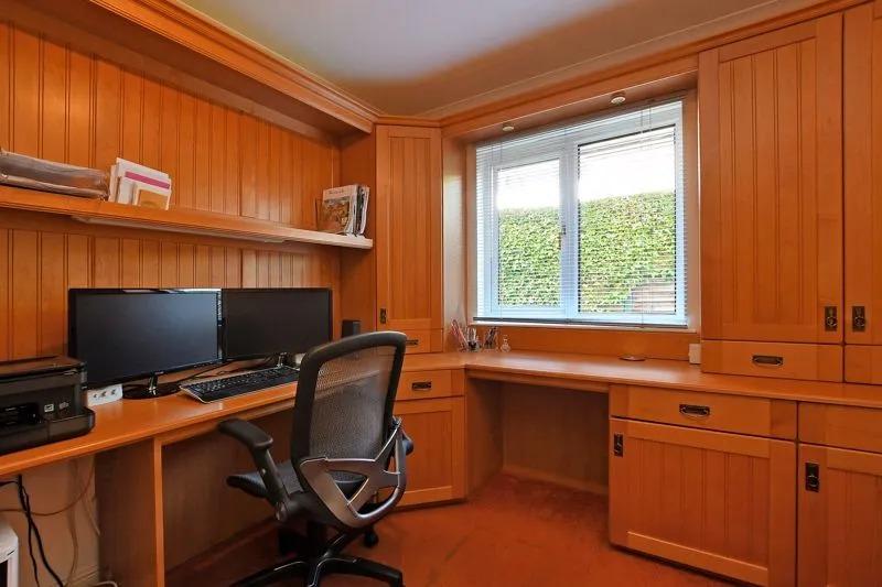 With lots of storage space, this is an ideal office for those working from home or organising family life.
