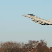 LINCOLN, ENGLAND - DECEMBER 09: A Typhoon takes off from RAF Coningsby in Linconshire during a visit by Prime Minister Rishi Sunak following the announcement that Britain will work to develop next-generation fighter jets with Italy and Japan, on December 9, 2022 in Lincoln, United Kingdom. Sunak is working on “new tough laws” to limit the impact of strikes, as Border Force staff prepared to join a wave of industrial action set to cause major travel disruption across the UK over Christmas. (Photo by Joe Giddens - WPA Pool/Getty Images)