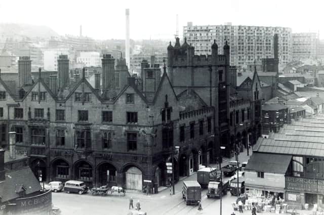 General view of the Old Corn Exchange, Sheffield, showing the new Park Hill redevelopment flats in the backgrounde and part of the wholesale fruit market, 1959Severely damaged by fire in 1947 and demolished in 1962