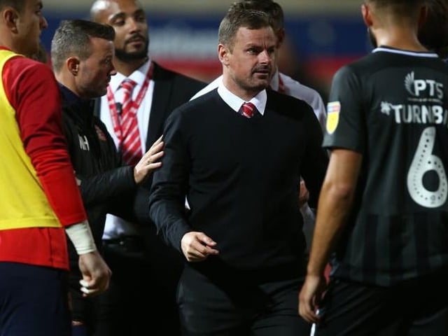 Richie Wellens has bemoaned the Robins' lack of activity in the transfer market after losing several key players following their League Two title triumph but believes  'with three or four bodies in, we might have an opportunity to'. They welcome Rochdale to the County Ground.
