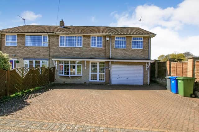 The property is described as a spacious, four-bedroom, semi-detached home.