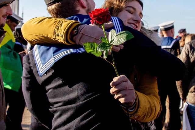 Crew members stepping off HMS Diamond embracing their loved ones. Picture: Habibur Rahman