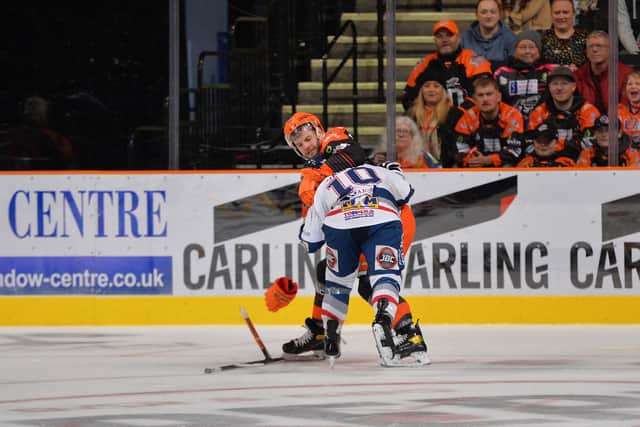 Sheffield Steelers' Robert Dowd fights Philippe Sanche. Picture: Dean Woolley