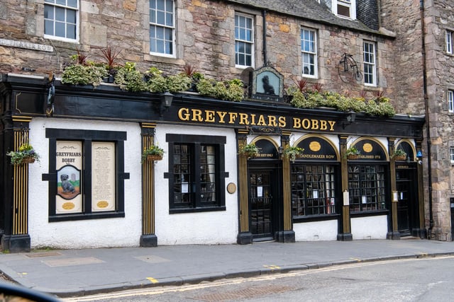 Iconic Greyfriars Bobby bar in Candlemaker Row, Edinburgh, is currently a sad sight as it remains firmly closed since social distancing measures were introduced. Bobby, the Skye Terrier statue, has been spotted wearing a medical mask for 'protection'