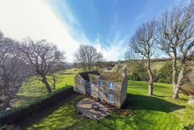 Rose Cottage is a pretty and detached cottage occupying an enviable position on the edge of the city.