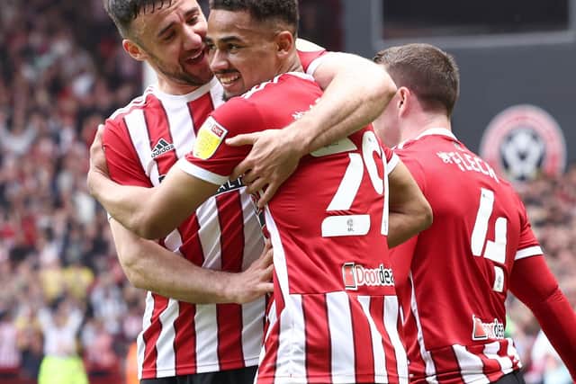 lliman Ndiaye (C) and Enda Stevens bring youth and experience respectively to Sheffield United: Darren Staples / Sportimage