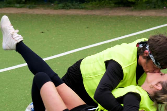 Richie Dews from Sheffield and his wife Lara Eyre get frisky on the football pitch in the hit E4 show Married at First Sight UK (photo: Channel 4/CPL Productions)
