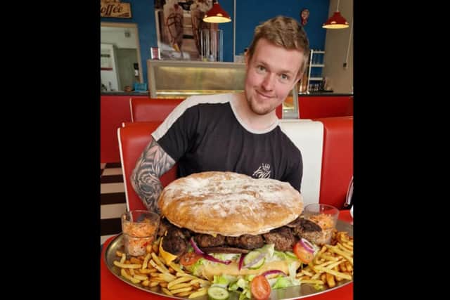 YouTube star KyleVfood was defeated by the 20lb burger at Shepherd’s Place Farm cafe.