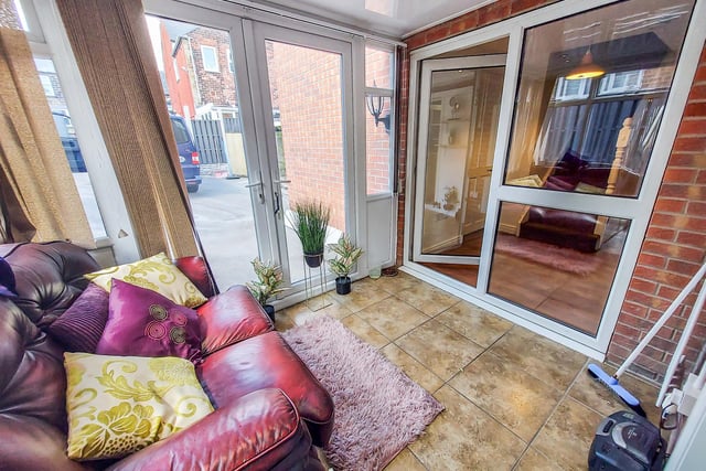 The ground floor conservatory also has French doors which open to the driveway.
