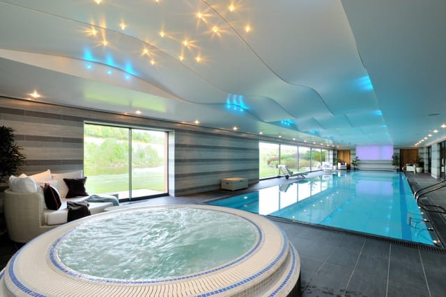 Below the main living spaces is an additional floor of leisure facilities including a generously sized swimming pool, complete with a Jacuzzi and sauna.