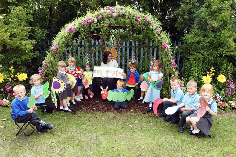 Newbottle Primary School nursery nurse Sharon Blake was pictured reading to children in the new story telling garden at the school 17 years ago.