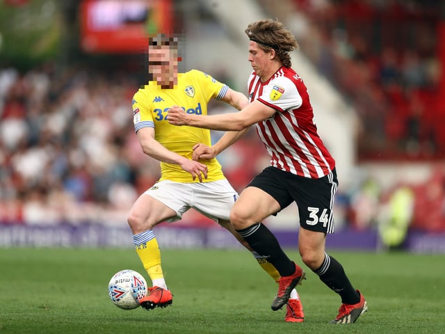 a) Adam Forshaw. b) Laurens de Bock. c) Luke Ayling. d) Samuel Sáiz.